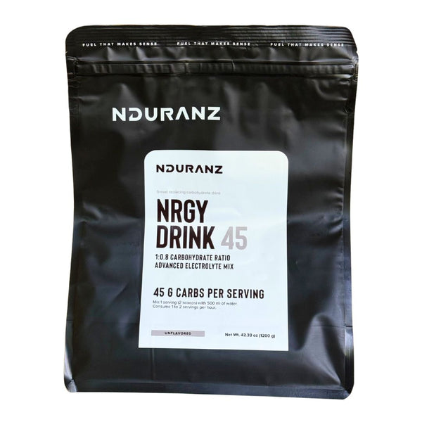 Nduranz Nrgy Drink 45 - 1200 g sin sabor, 25 porciones, bolsa negra, etiqueta blanca con logo de la marca y texto nutricional sobre fondo blanco.